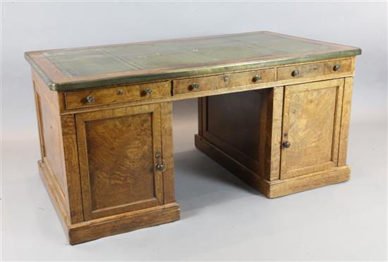 A Victorian brass bound pollard oak partners desk, W.5ft 3in. D.3ft H.2ft 6in.